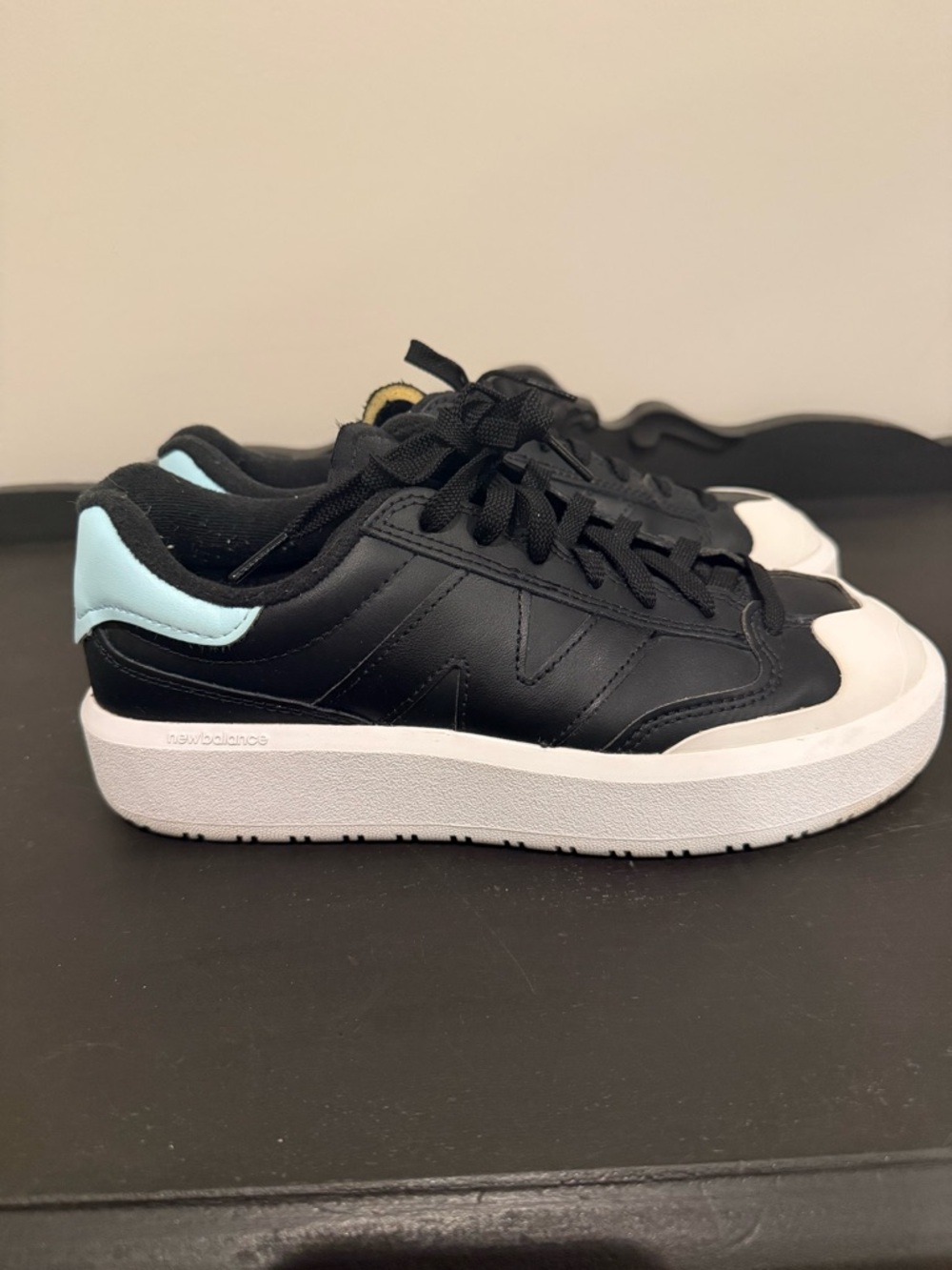 New Balance CT302 Black Sneakers with Light Blue Heel Accent